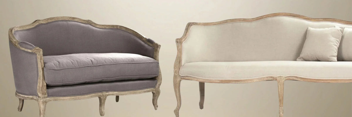 French country-style settee and sofa with distressed wood frames, upholstered in gray and cream fabric