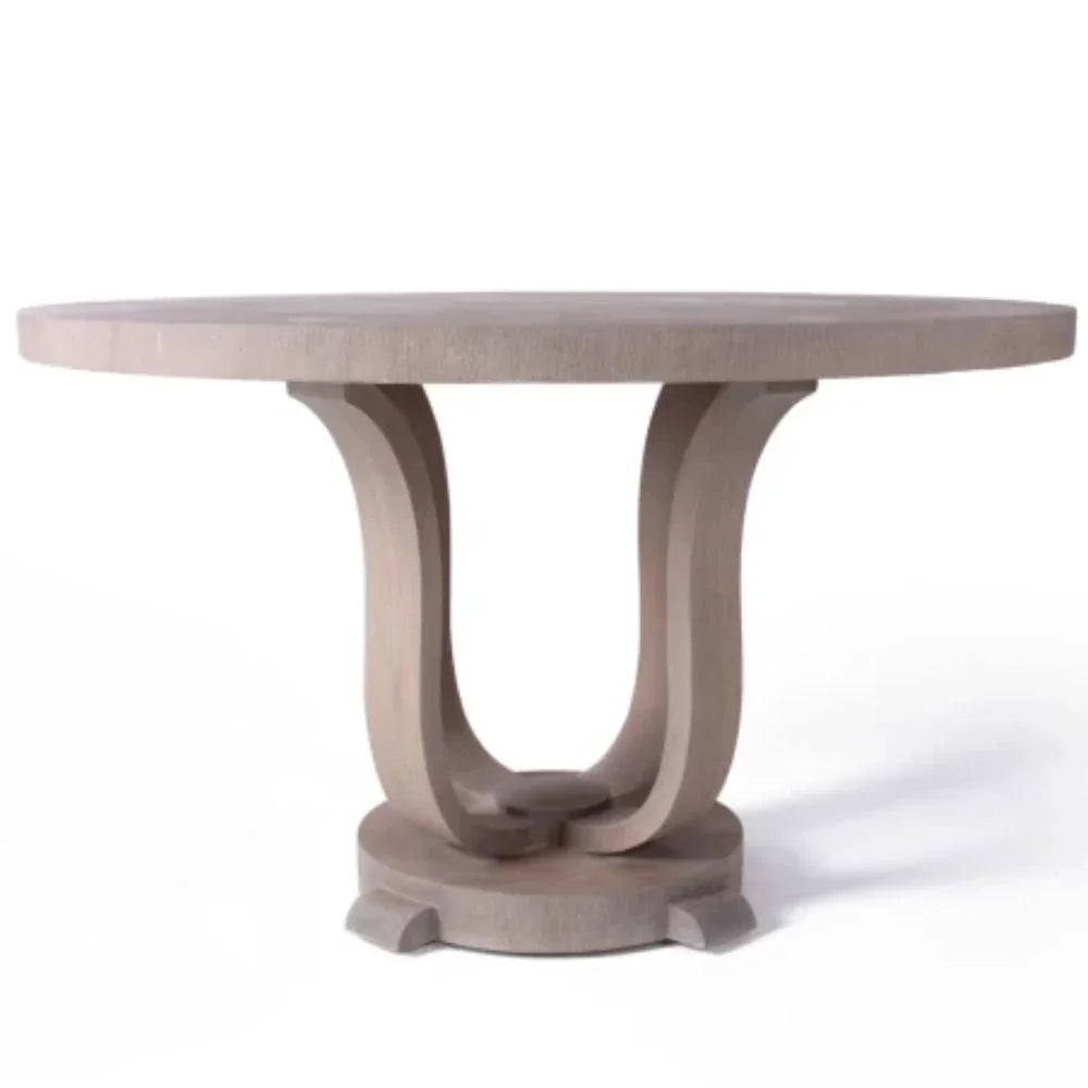Round wooden dining table with elegant curved pedestal base, French country farmhouse style