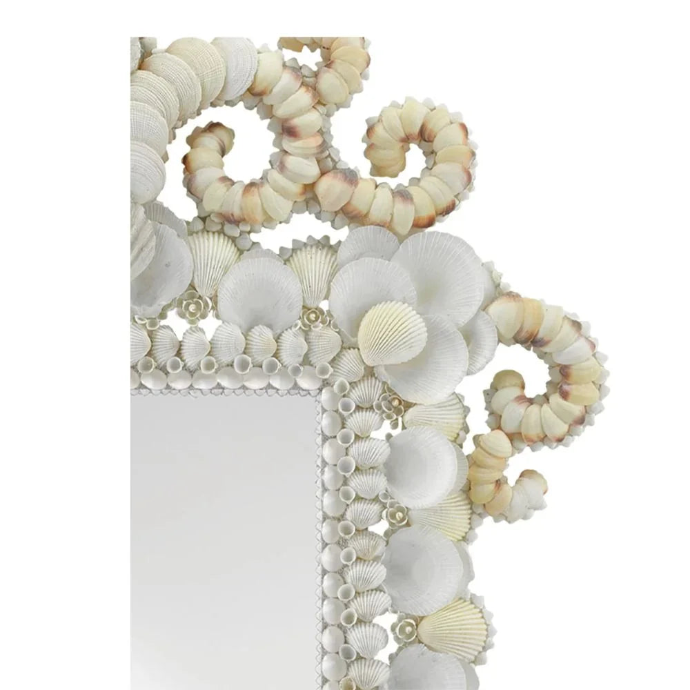 Coastal shell mirror with intricate seashell frame, perfect for beachy or boho home decor.