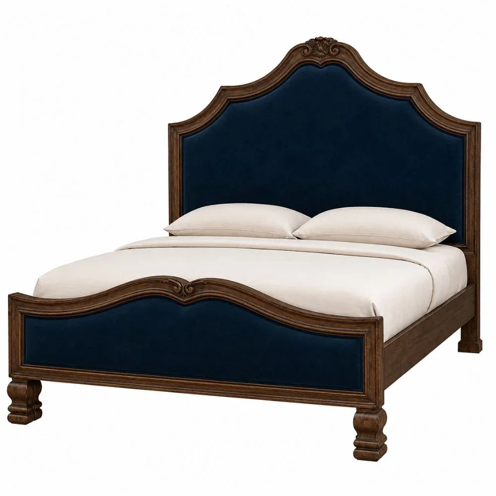 Elegant French country bed with navy velvet upholstery and carved wood frame