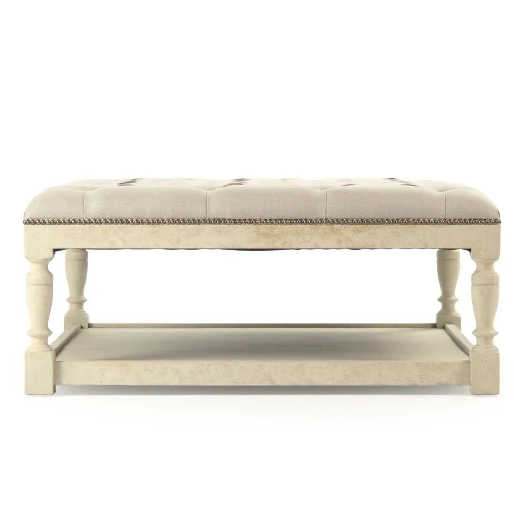 Cream tufted bench with nailhead trim, farmhouse style, distressed finish, lower shelf
