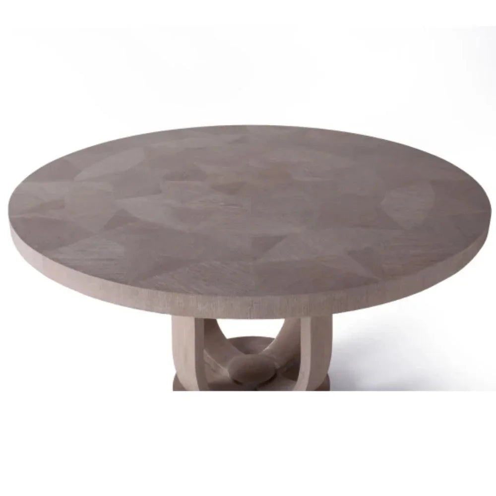 Round wooden dining table with geometric inlay, farmhouse style