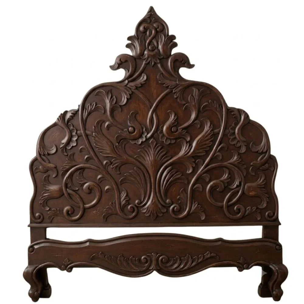Ornate French country wooden headboard with intricate floral carvings and elegant curves