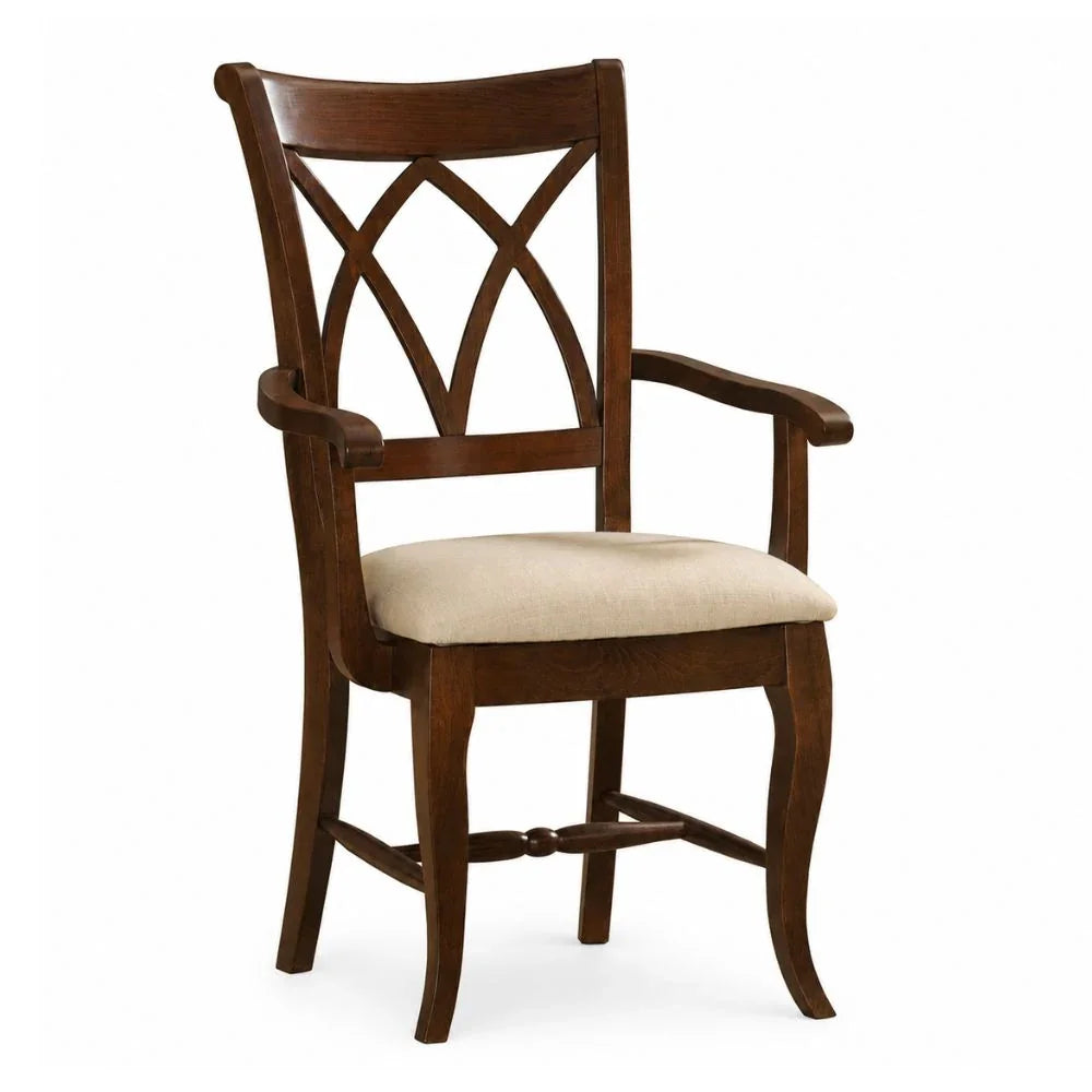 Dark wood armchair with X-back design and beige upholstered seat in farmhouse style.