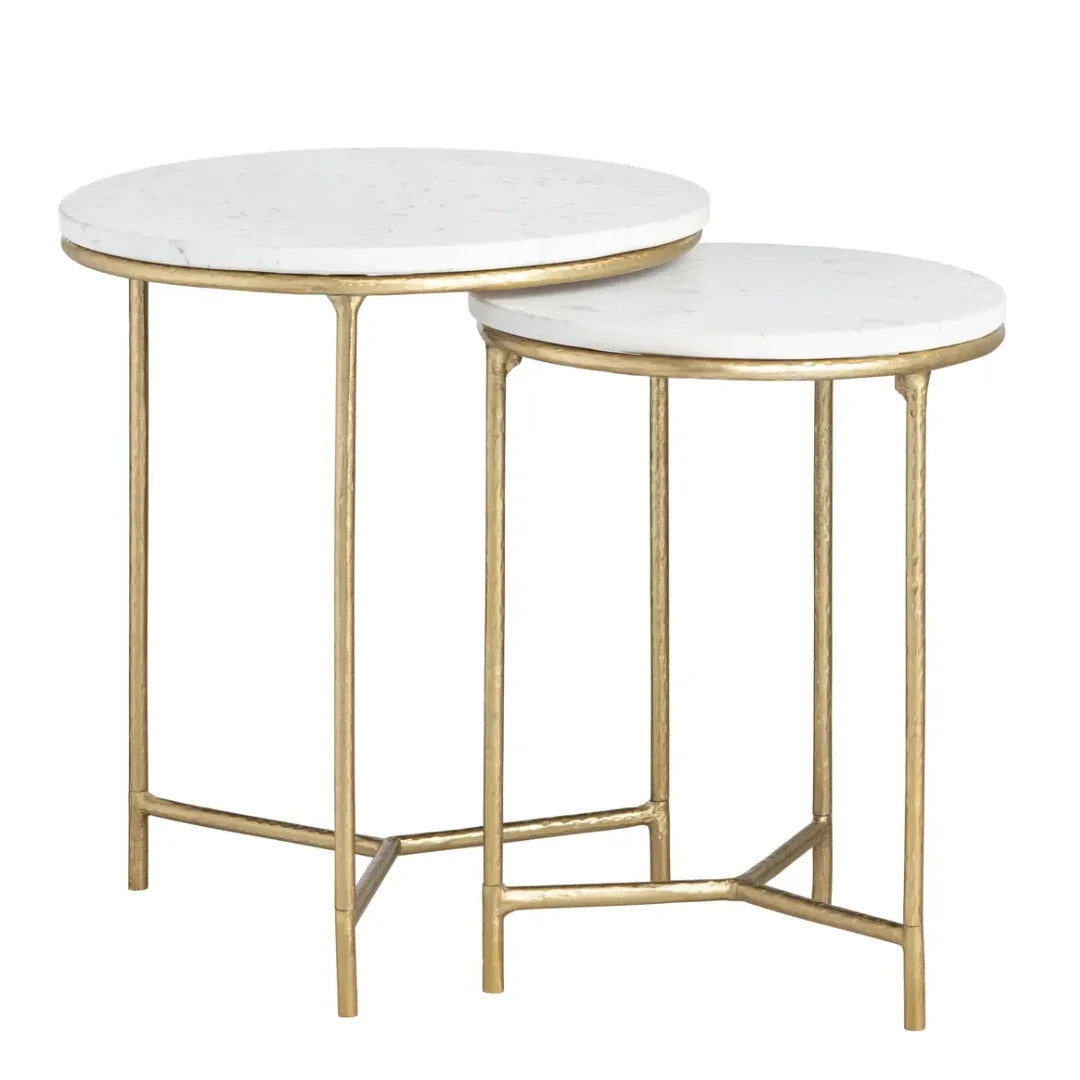 Set of nesting side tables with white marble tops and gold metal frames in a modern style.