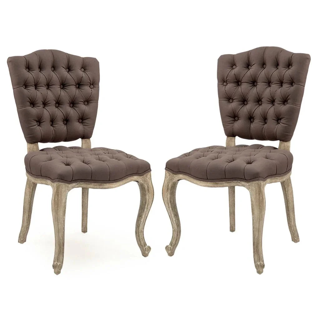 Elegant tufted dining chairs with distressed wood legs, French country style