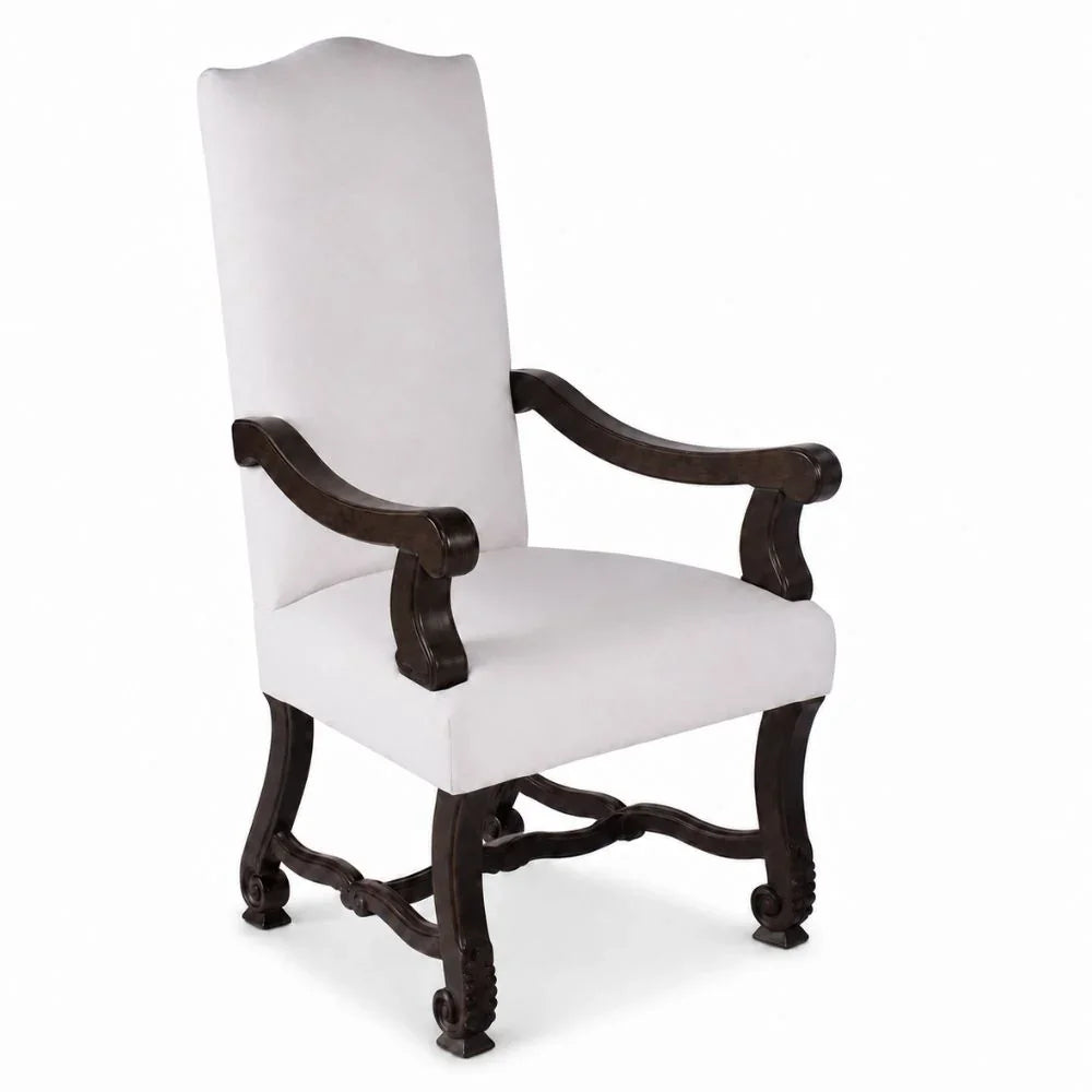 Elegant white upholstered armchair with dark wood frame, French country style