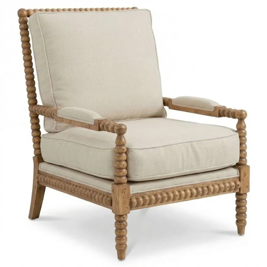 French country armchair with turned wood frame and neutral linen cushions, perfect for shabby chic or farmhouse decor