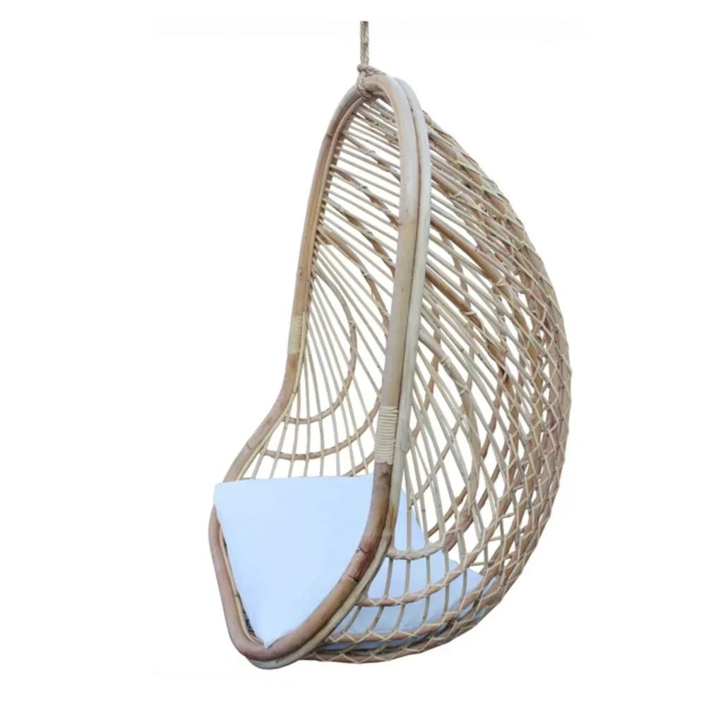 Natural rattan hanging egg chair with white cushion, boho coastal style