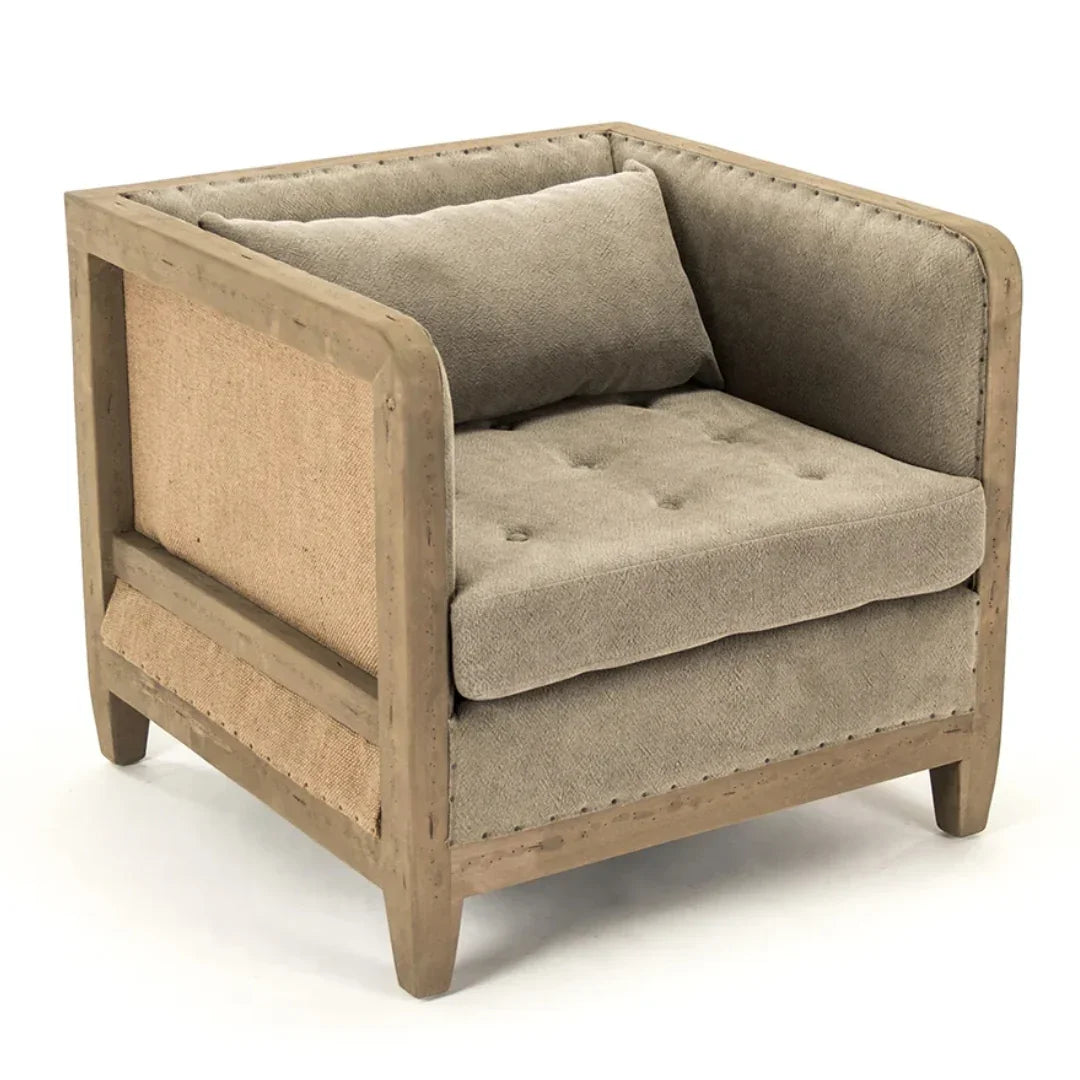 Cozy beige tufted armchair with rustic wood frame, perfect for farmhouse or shabby chic decor