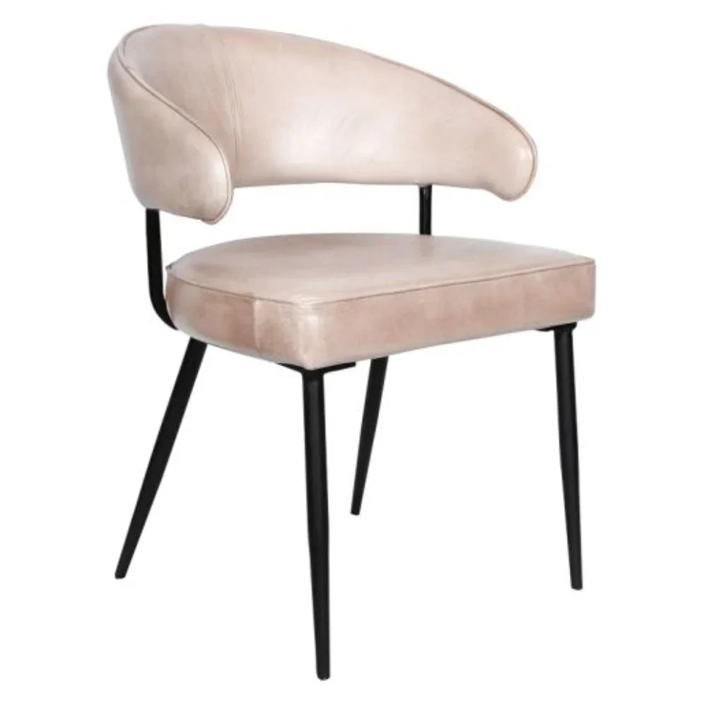 Elegant beige upholstered chair with black metal legs, perfect for French country or farmhouse decor