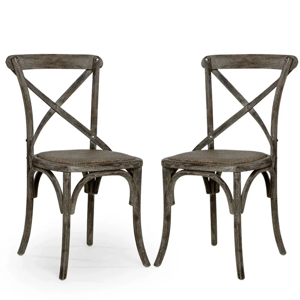 Rustic wooden cross-back dining chairs with woven seats, perfect for farmhouse or shabby chic decor