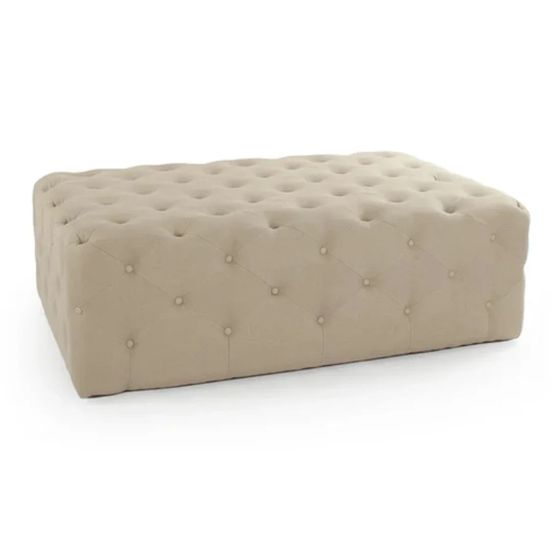 Beige tufted ottoman in French country style with button detailing