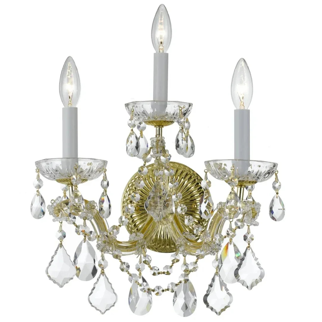 Elegant gold wall sconce with crystal droplets and candle-style bulbs, perfect for French country or shabby chic decor