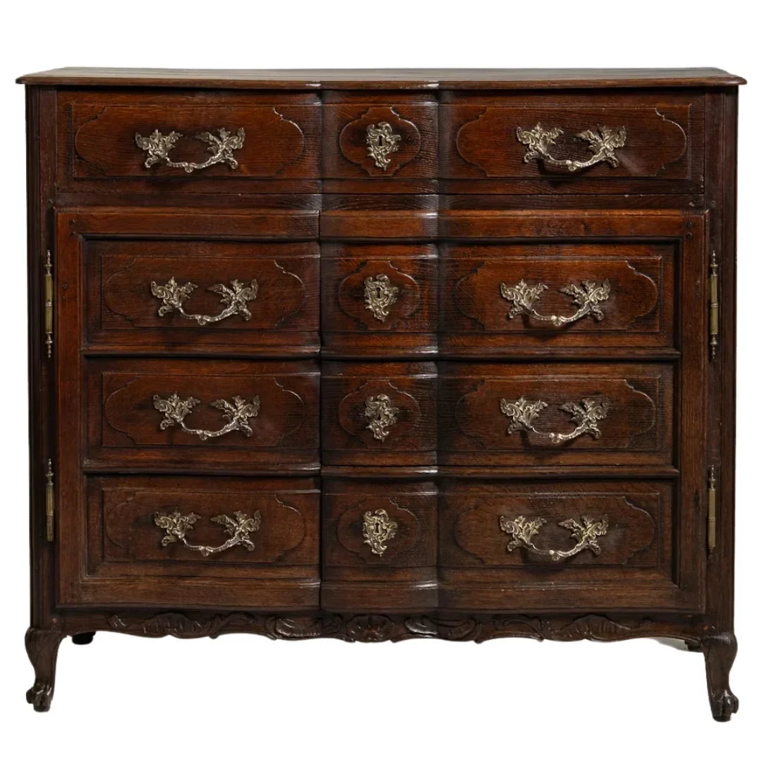 Antique French oak dresser with ornate brass hardware and carved details, perfect for shabby chic or farmhouse decor