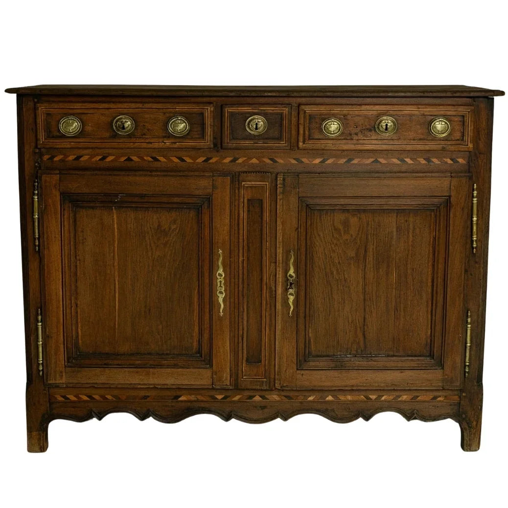 Antique wooden sideboard with brass hardware and inlay details, French country style
