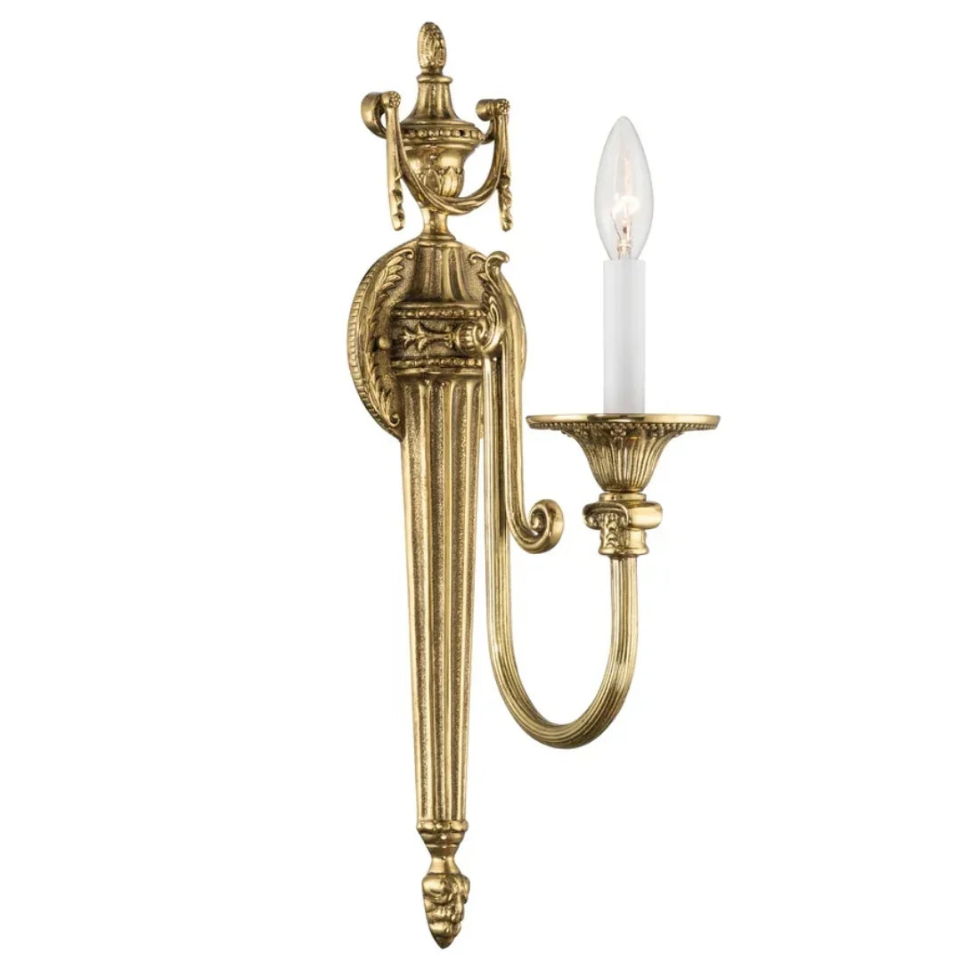 Elegant gold French country wall sconce with ornate detailing and candle-style bulb