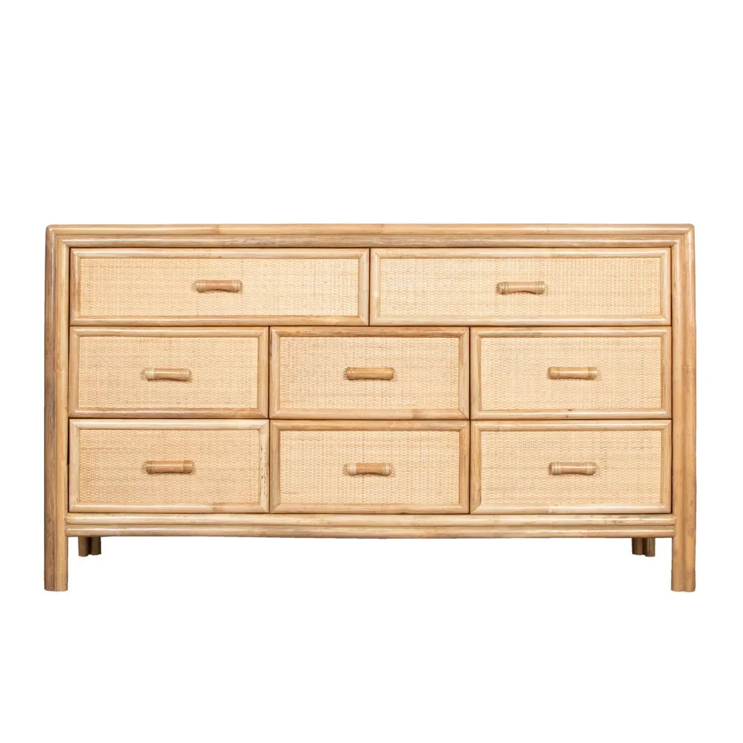 Natural boho rattan dresser with eight drawers and wooden handles, perfect for coastal or farmhouse decor