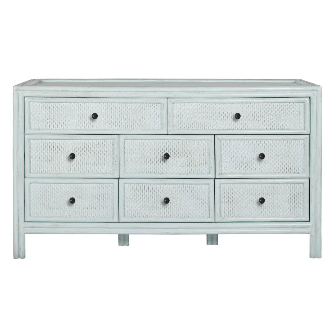 Light blue distressed dresser with cane drawer fronts and black knobs, farmhouse style