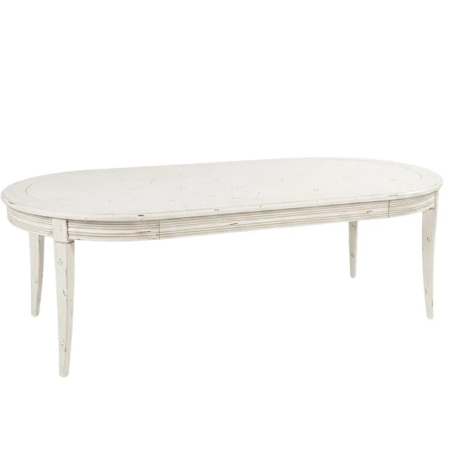 Elegant white oval coffee table with distressed finish, perfect for French country or shabby chic decor