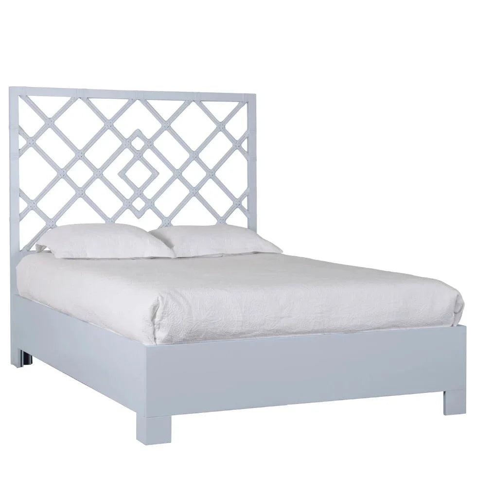 Light gray lattice headboard bed in farmhouse style with white bedding