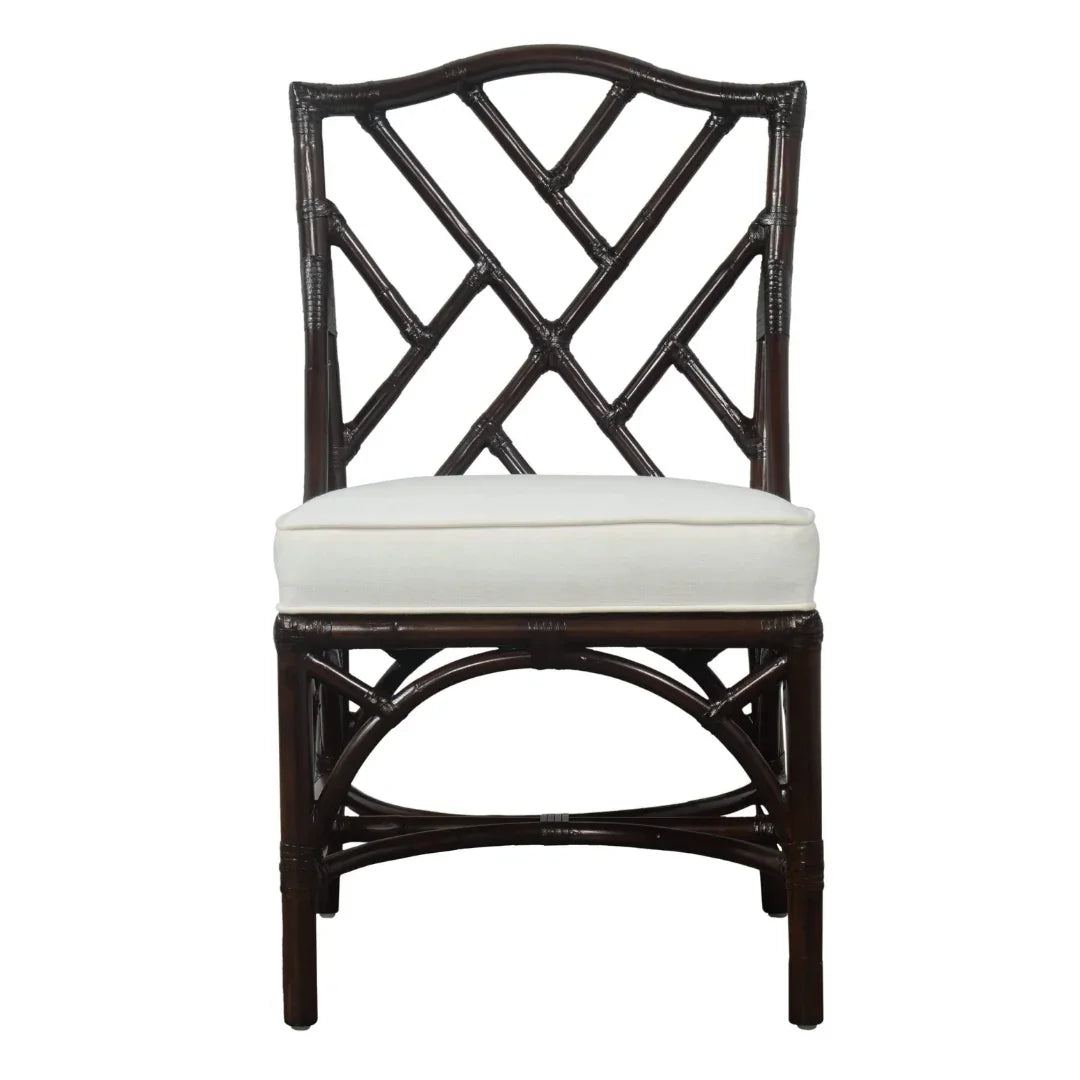 Dark rattan dining chair with white cushion, coastal farmhouse style