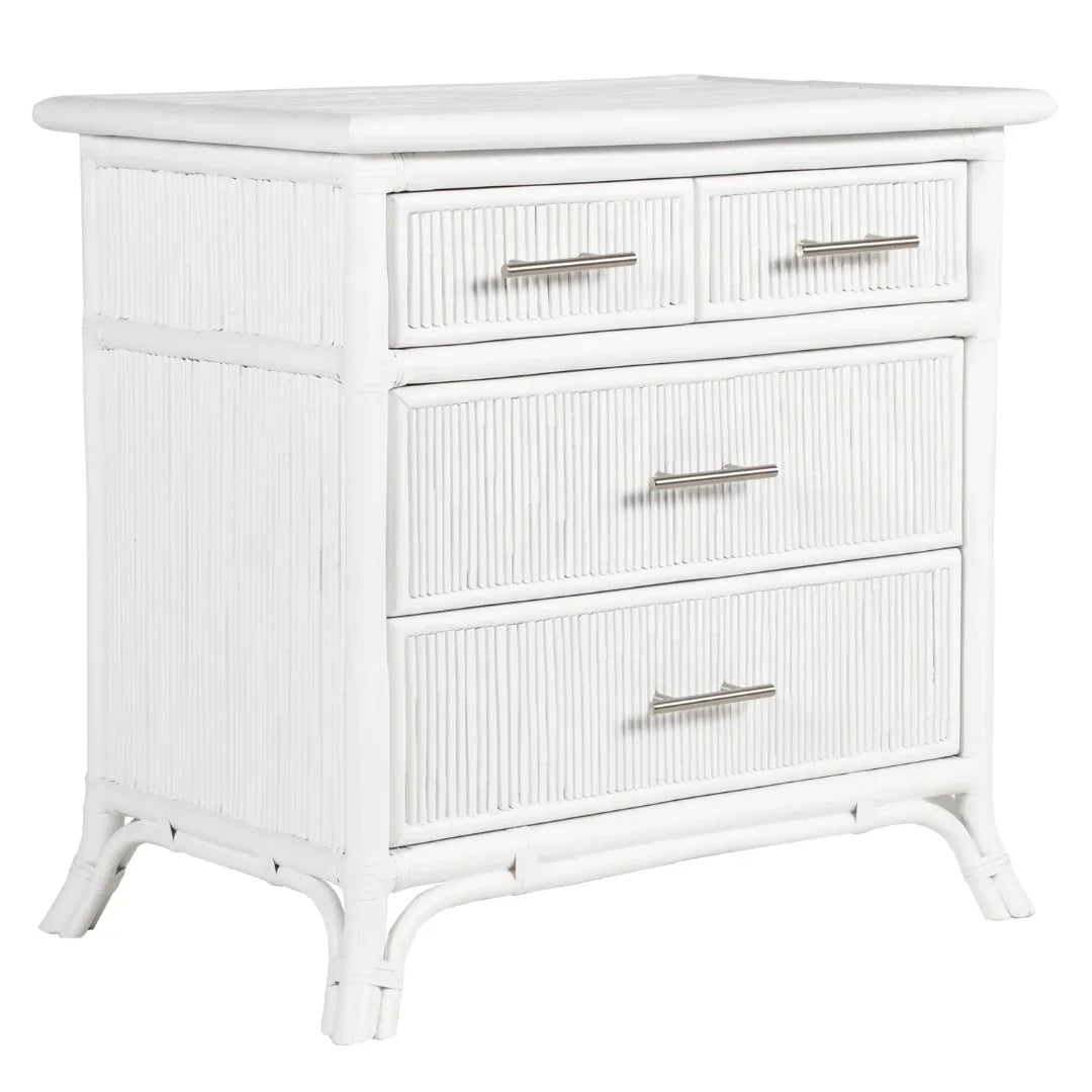 White rattan dresser with four drawers and metal handles, coastal farmhouse style