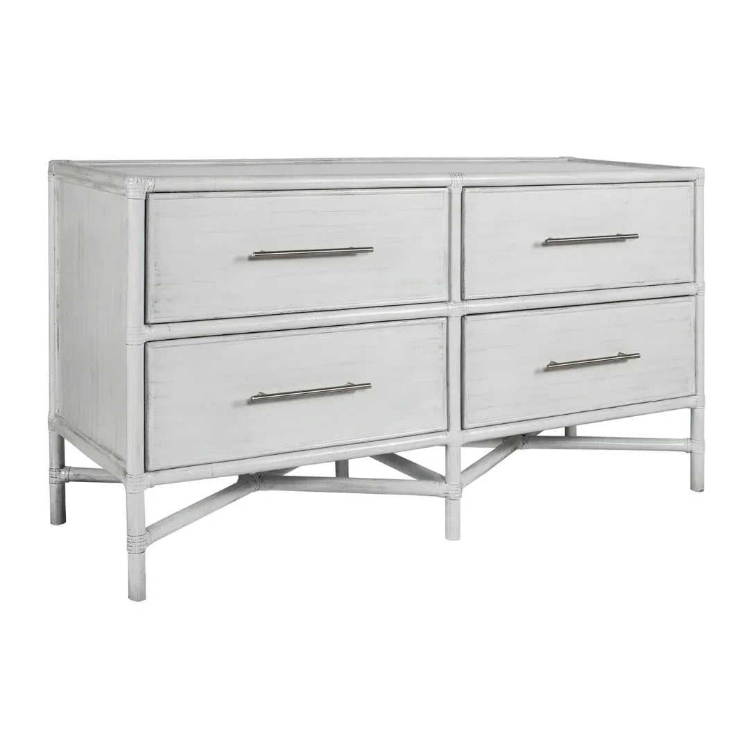 White coastal style 4-drawer dresser with silver handles and bamboo-style frame.