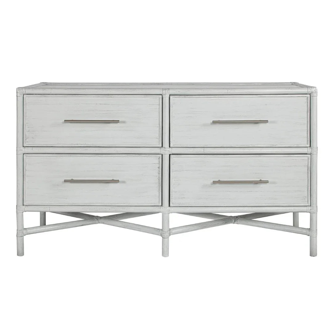 White rattan dresser with four drawers, coastal farmhouse style, metal bar handles, X-base legs