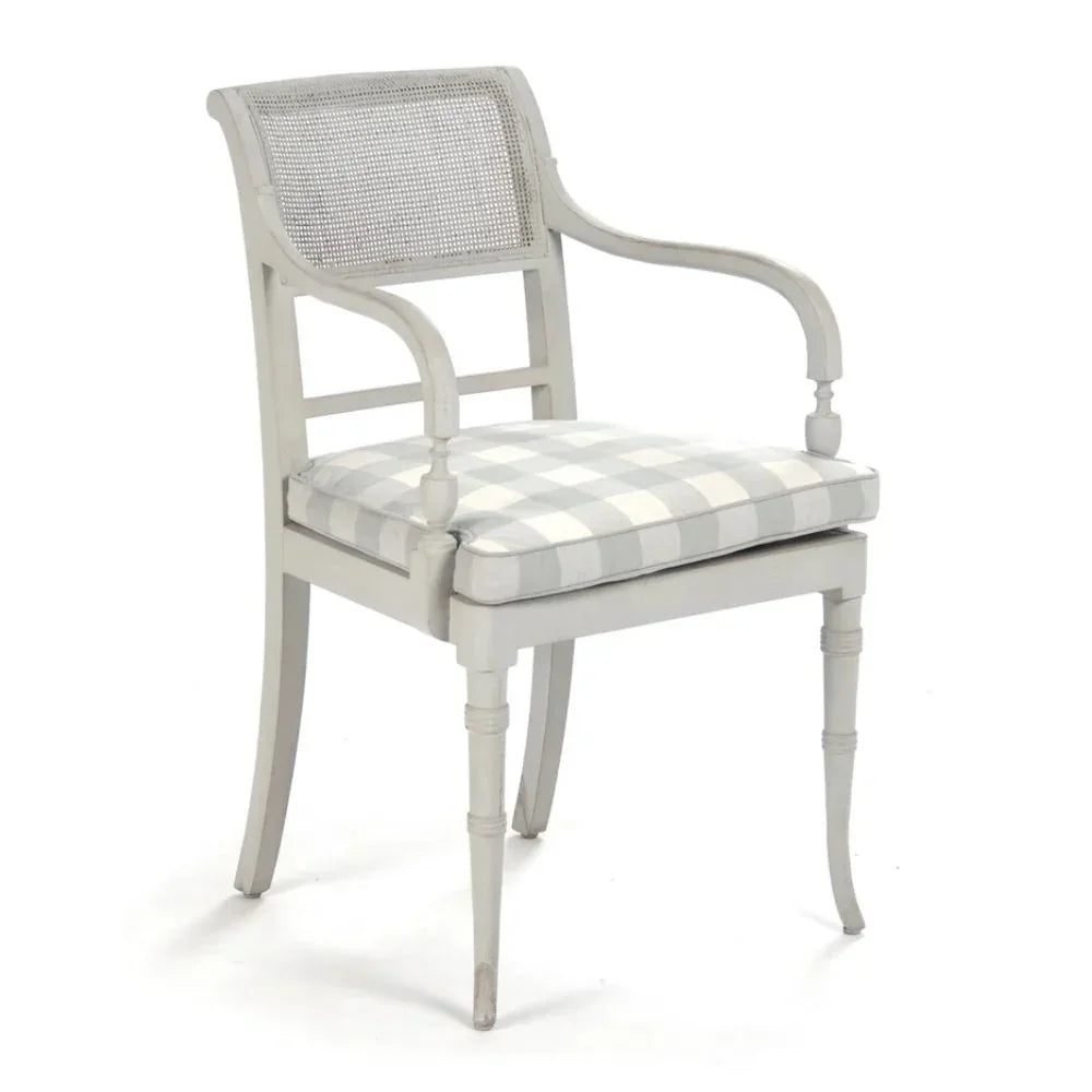 Elegant French country armchair with cane back and gingham cushion, perfect for shabby chic or farmhouse decor.