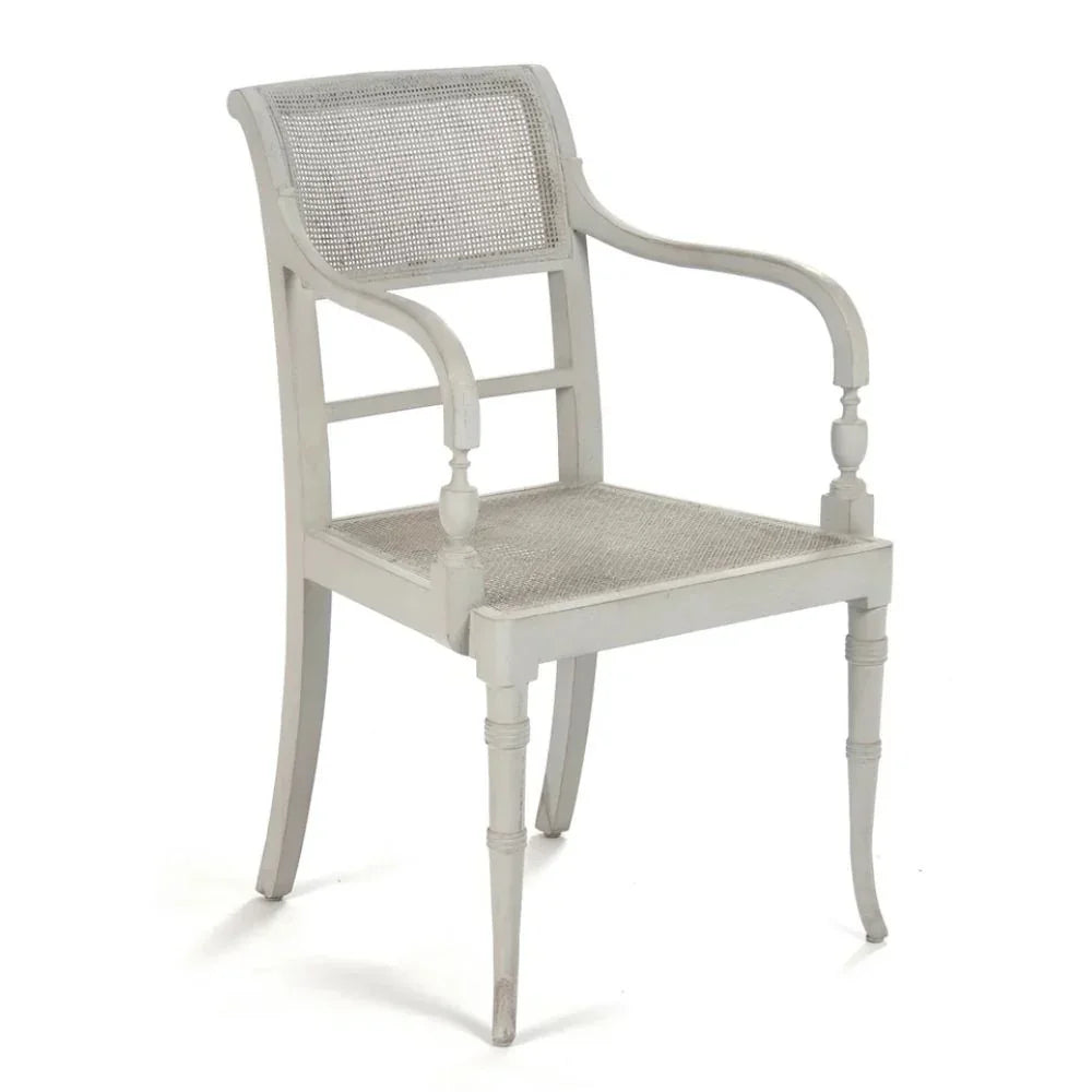 Elegant gray cane-back armchair in French country style with turned legs