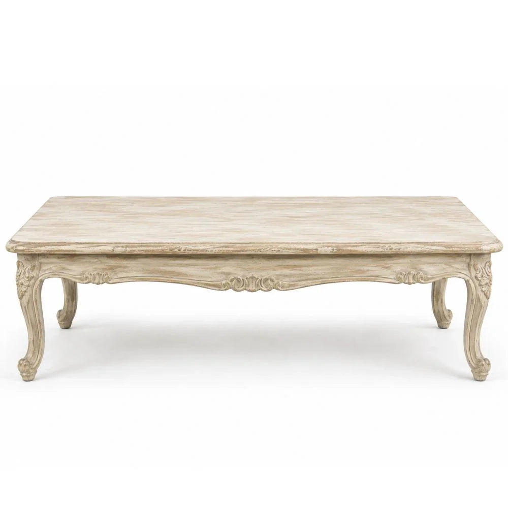 Distressed French country coffee table with ornate carved legs and shabby chic finish