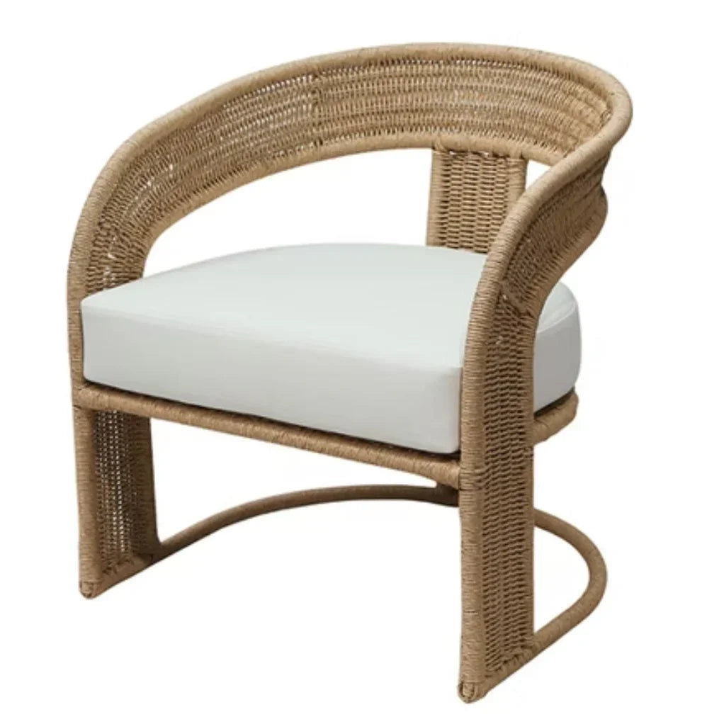 Natural woven rattan armchair with white cushion, coastal boho style accent chair