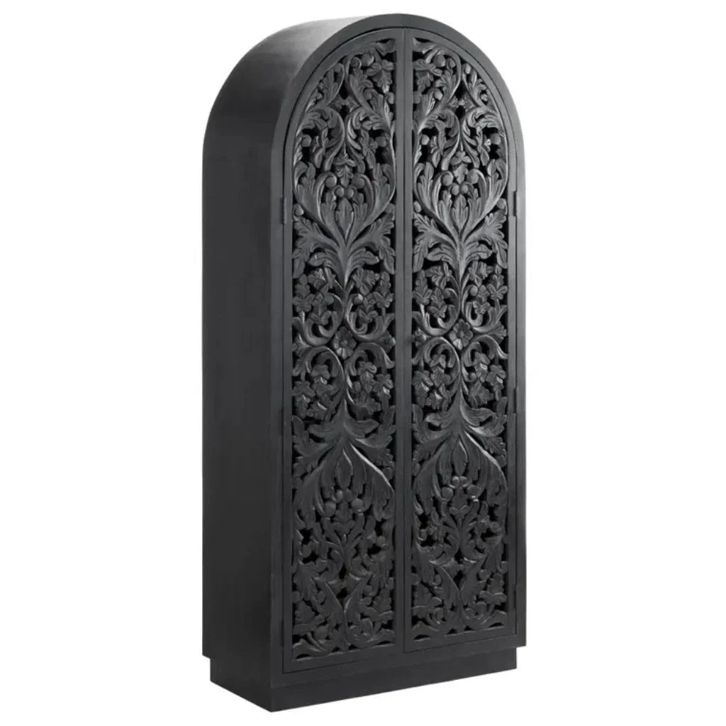 Black arched cabinet with intricate floral carvings, French country style