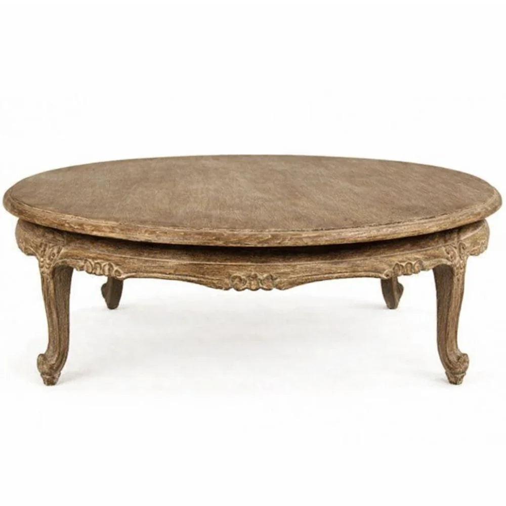 Elegant round coffee table with ornate carved cabriole legs in French country style