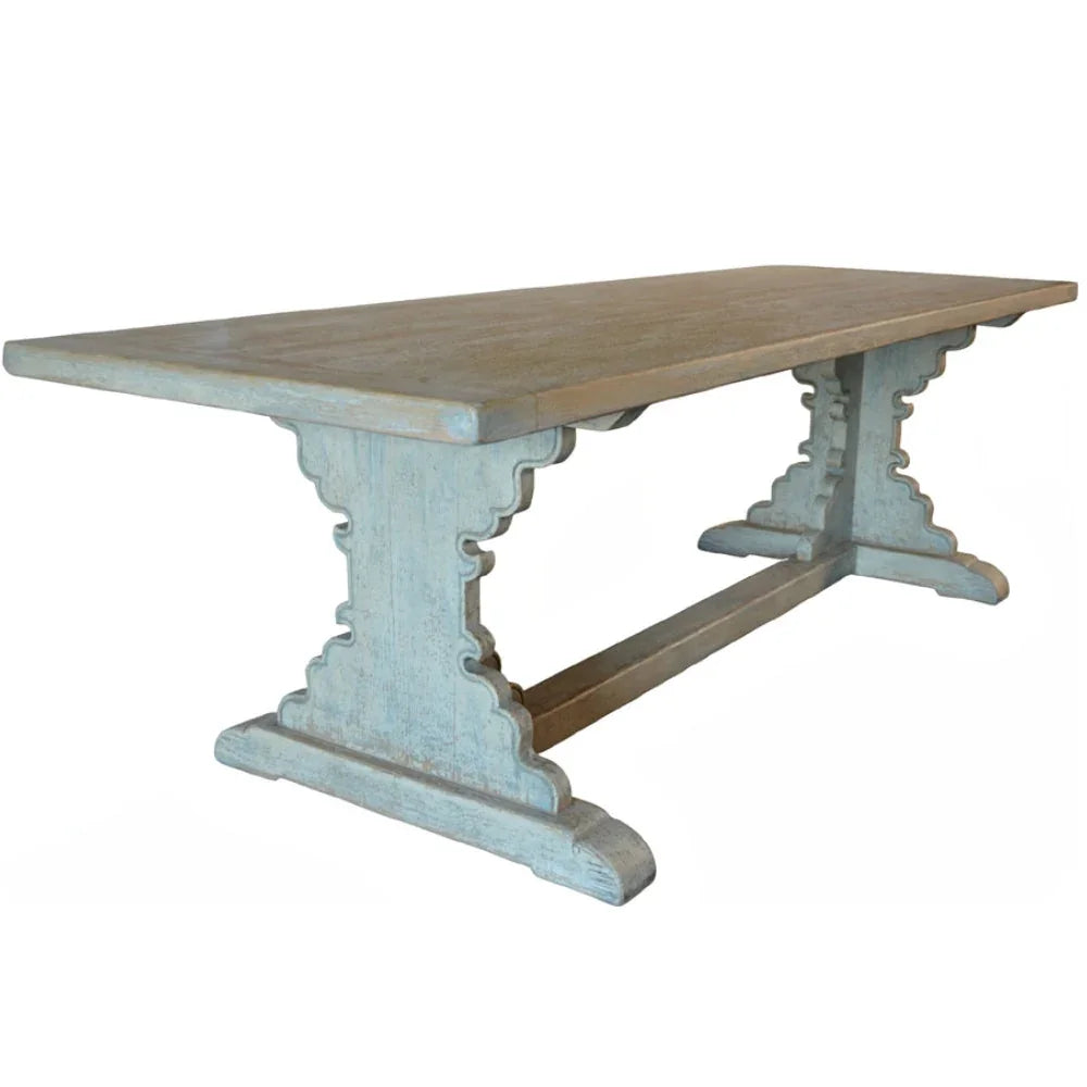 Rustic farmhouse dining table with distressed blue legs and natural wood top