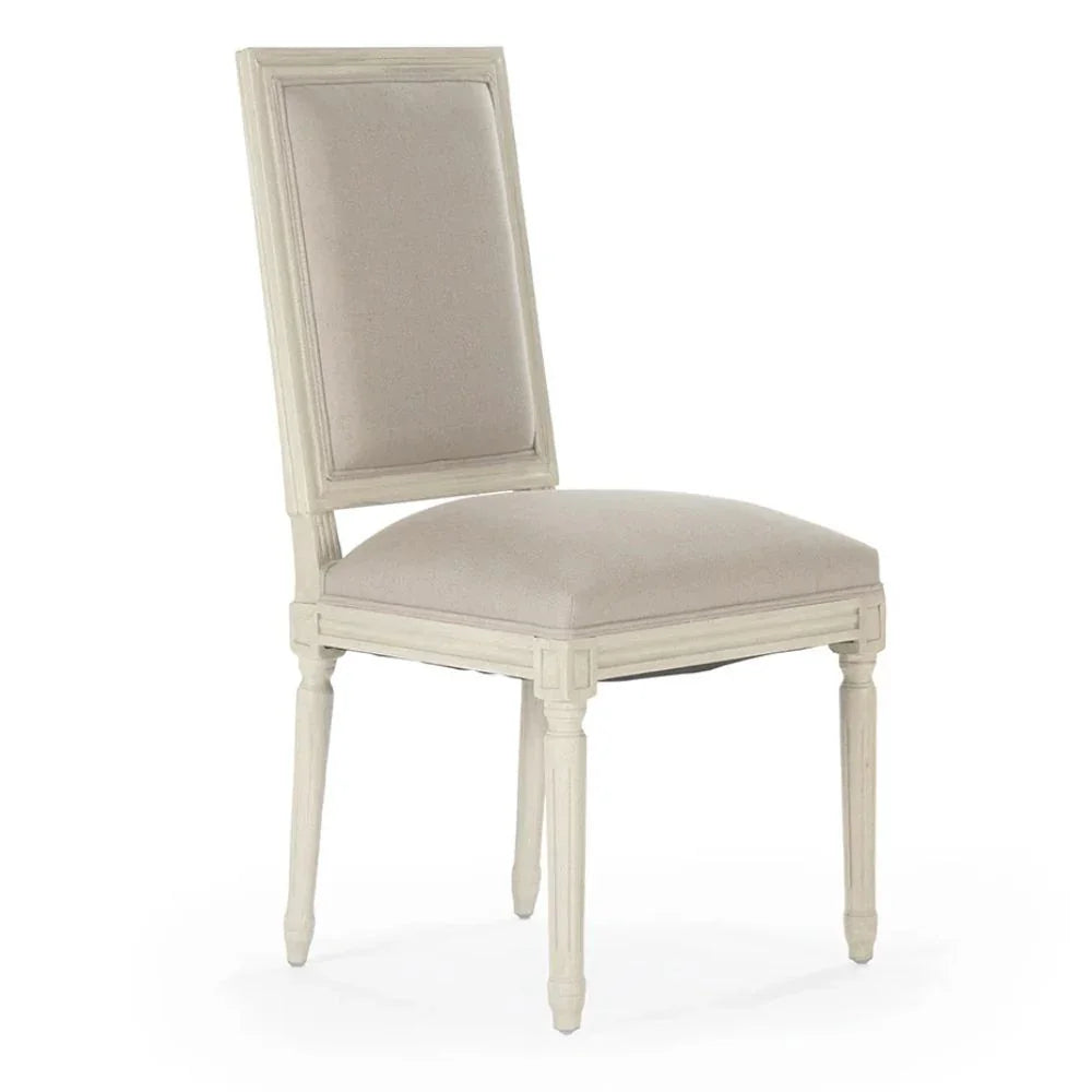 Elegant French country dining chair with beige upholstery and distressed white frame