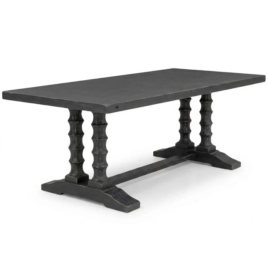 Black farmhouse dining table with carved trestle legs, rustic shabby chic style