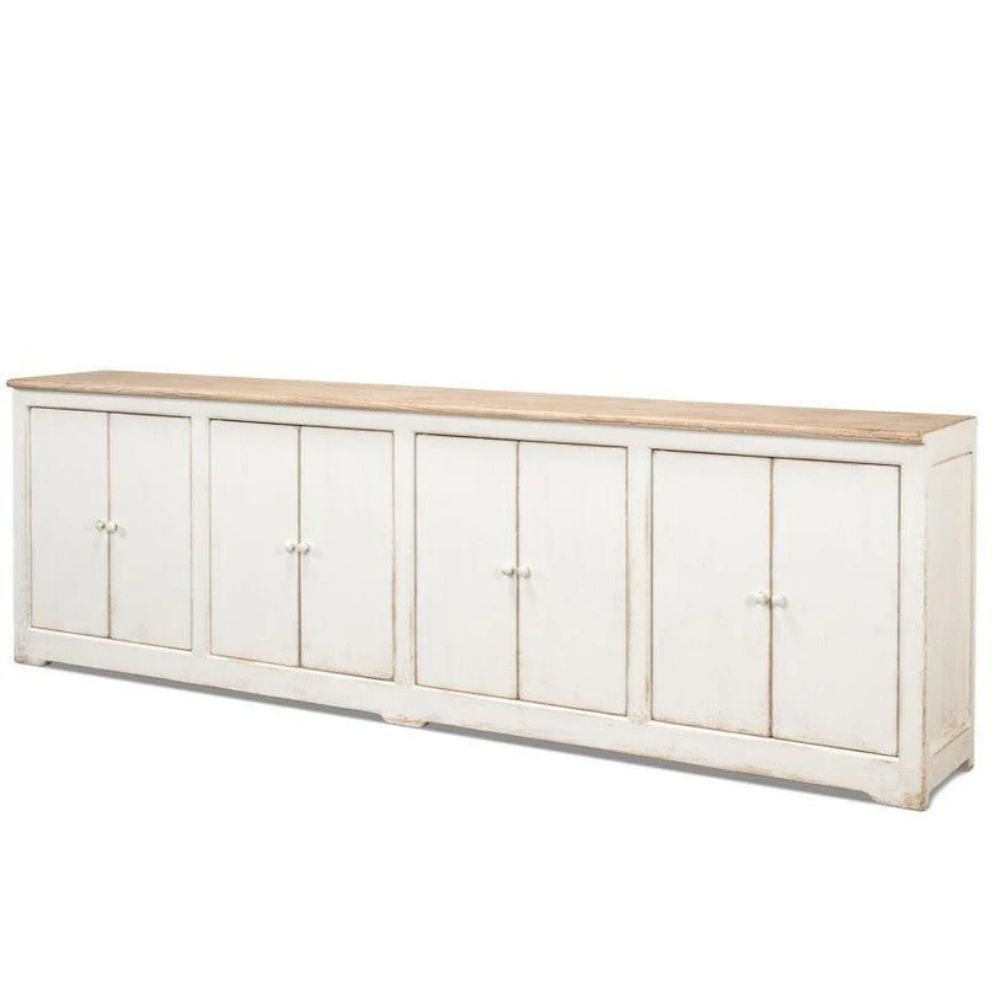 White distressed farmhouse sideboard with natural wood top and four cabinet doors