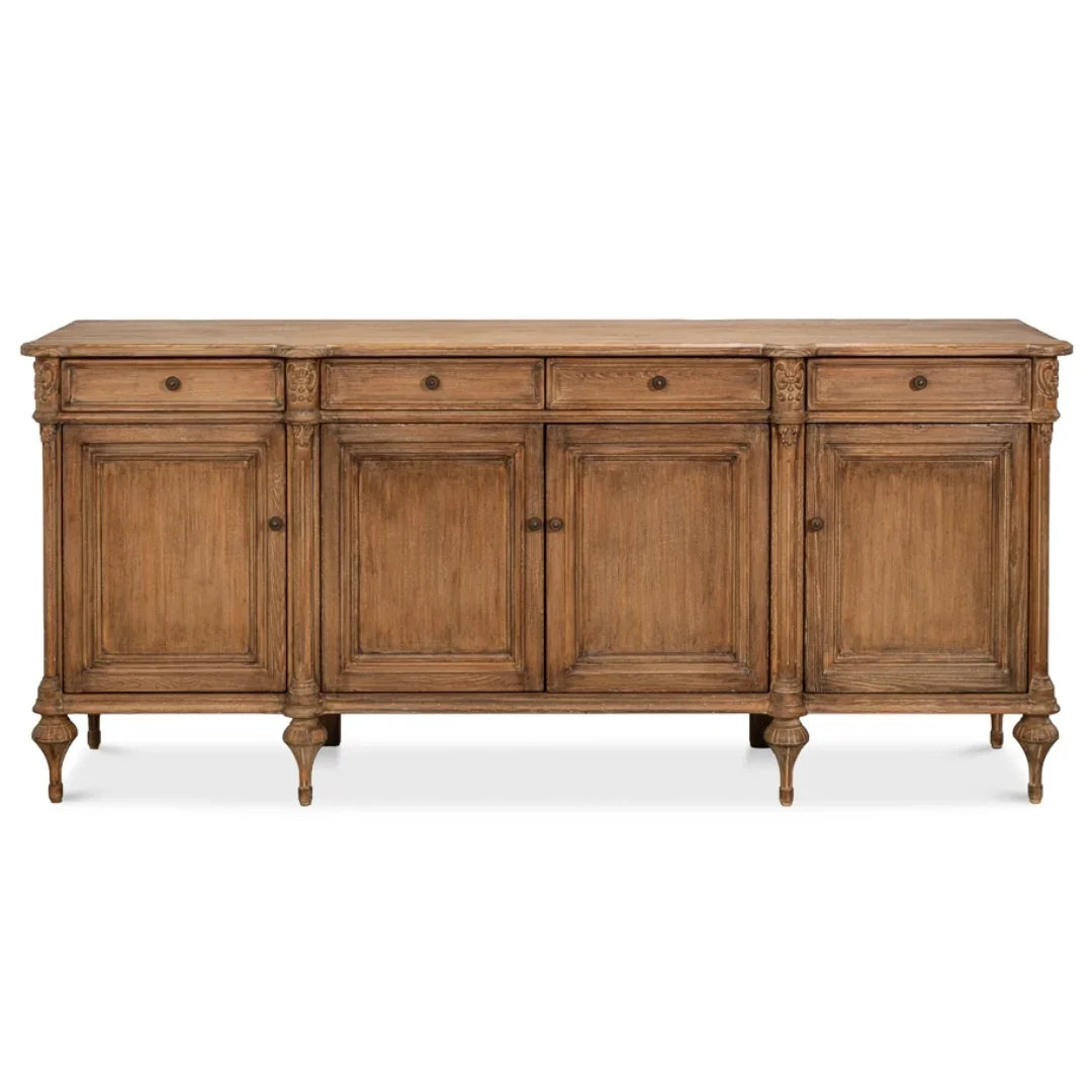 Rustic French country sideboard with carved wood, four drawers, and cabinet doors on turned legs