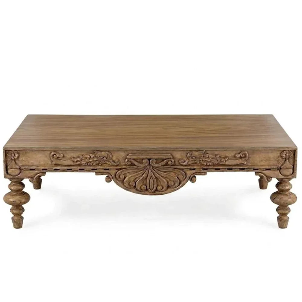 Hand-carved wooden coffee table with ornate detailing, French country style