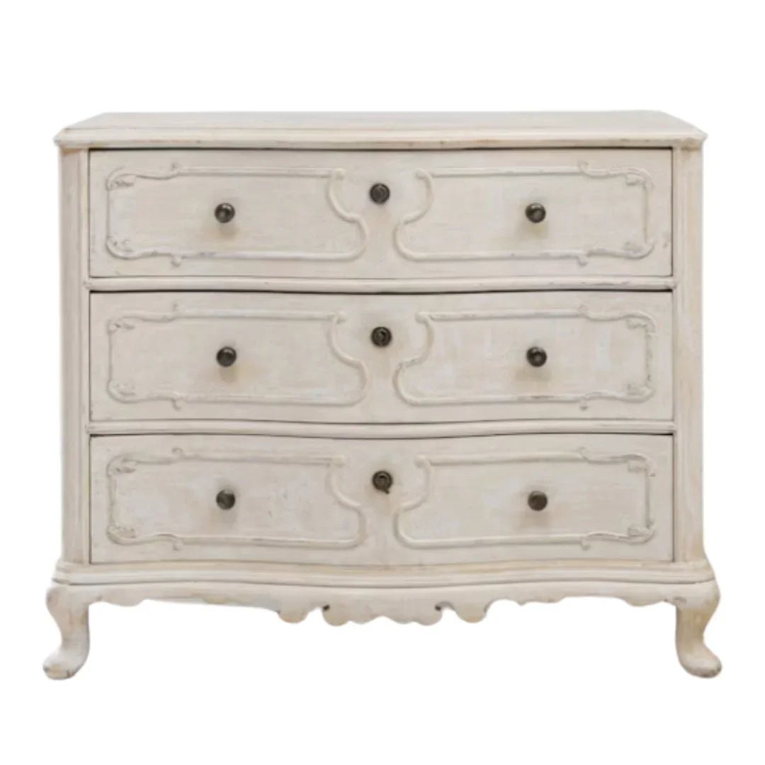 White shabby chic dresser with ornate carvings and vintage hardware, French country style