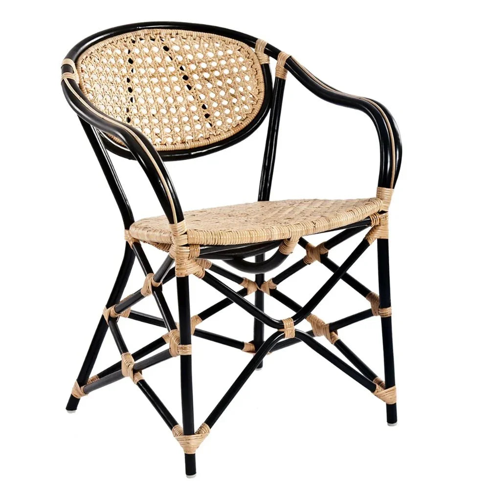 Black rattan armchair with woven cane seat and back, coastal boho style furniture