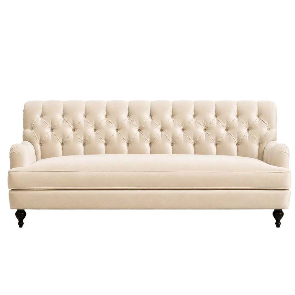 Cream tufted sofa with rolled arms and dark wood legs, French country style furniture