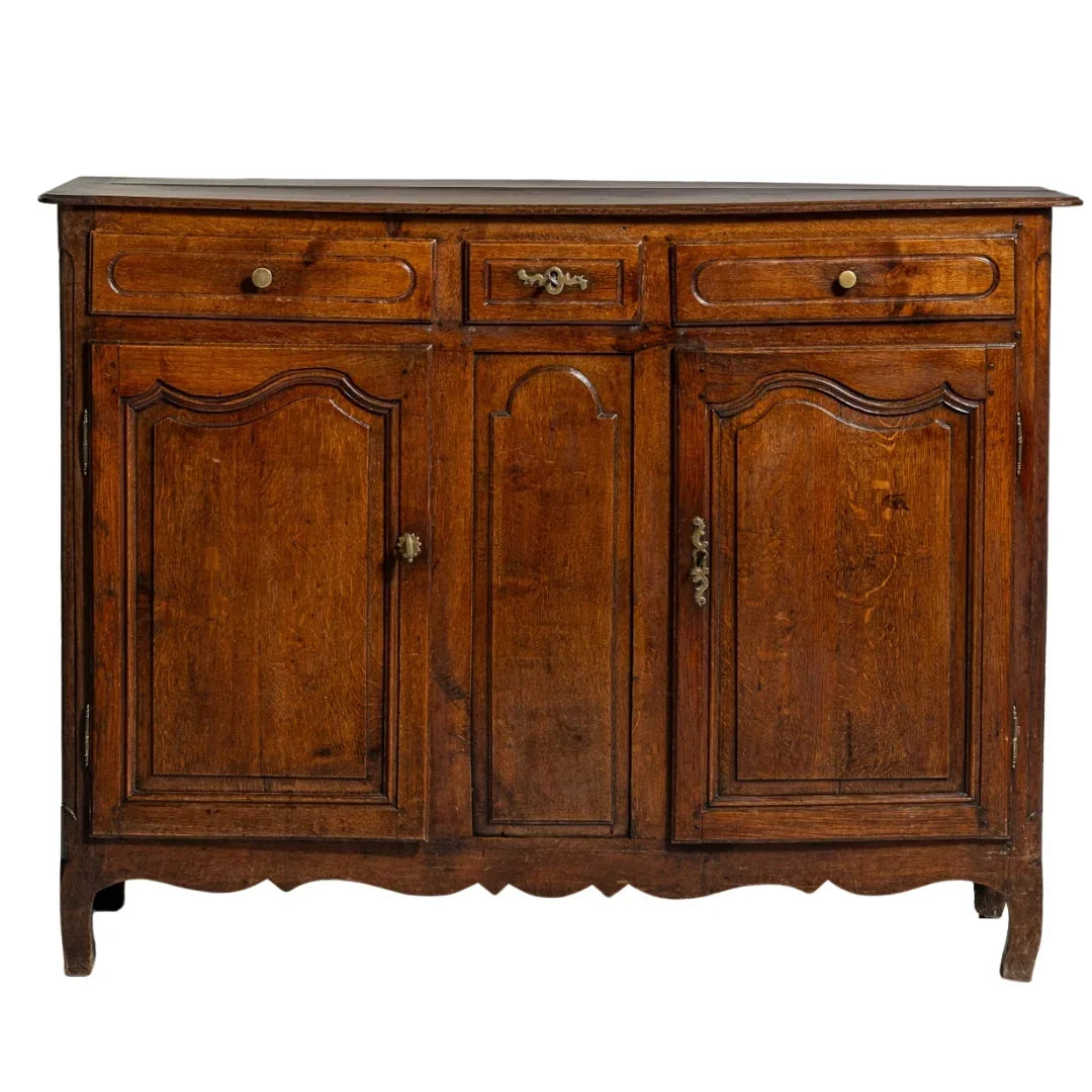 French country wooden sideboard with carved doors, drawers, and scalloped base, vintage farmhouse style