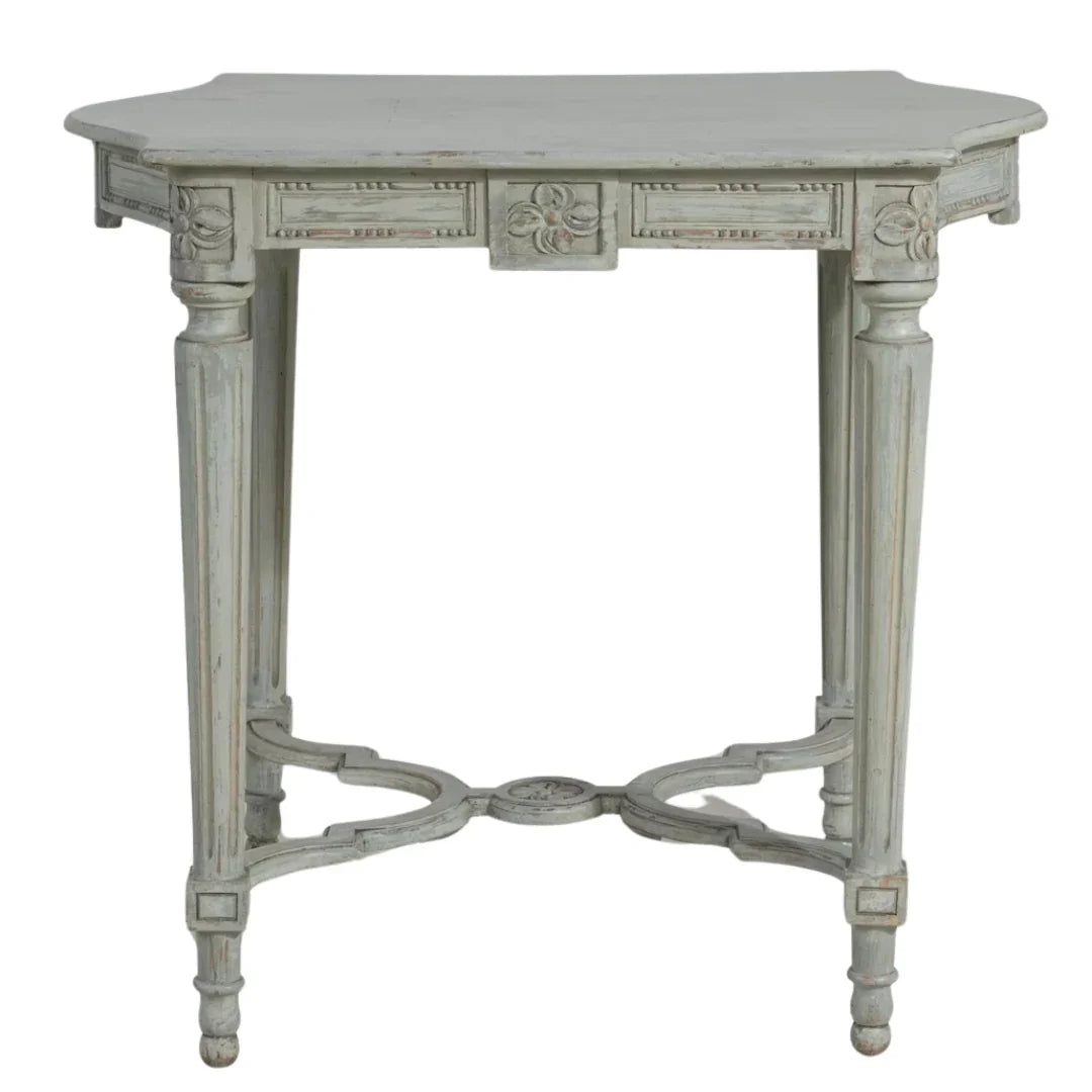 Distressed gray French country console table with carved details and elegant legs