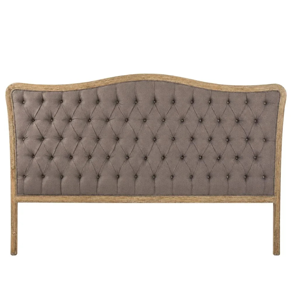 Tufted upholstered headboard with diamond button detailing and distressed wood frame, French country style