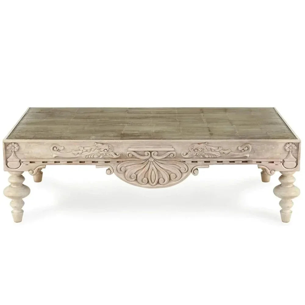 Elegant French country coffee table with ornate carvings and turned legs, perfect for shabby chic or farmhouse decor
