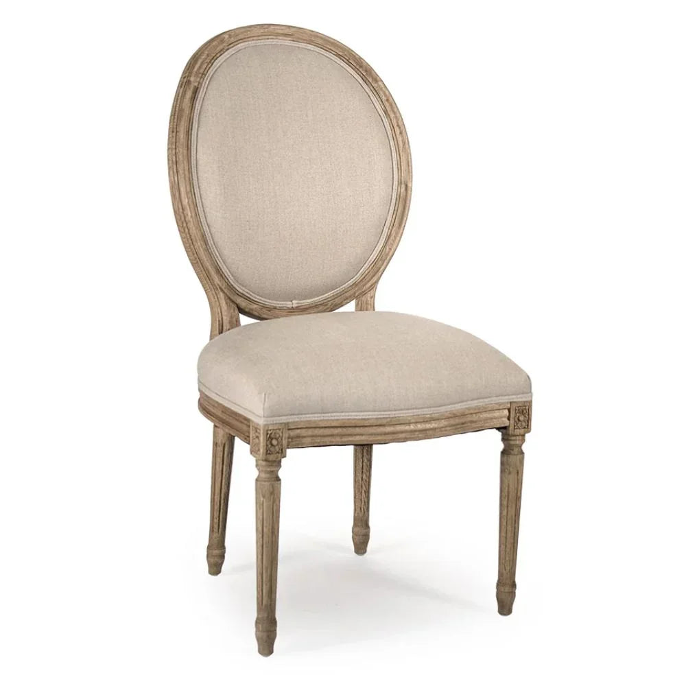 Elegant French country dining chair with oval back, distressed wood frame, and neutral upholstery