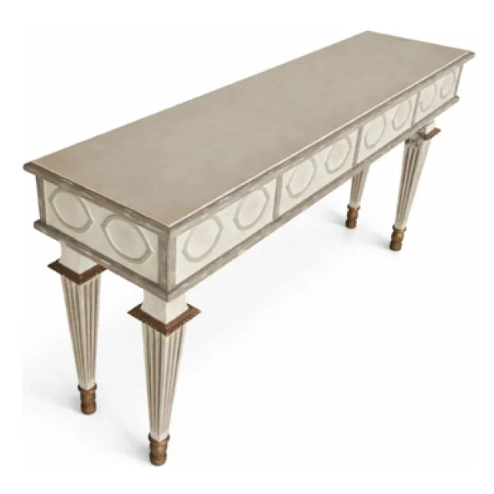 Elegant French country console table with ornate detailing and fluted legs in neutral tones